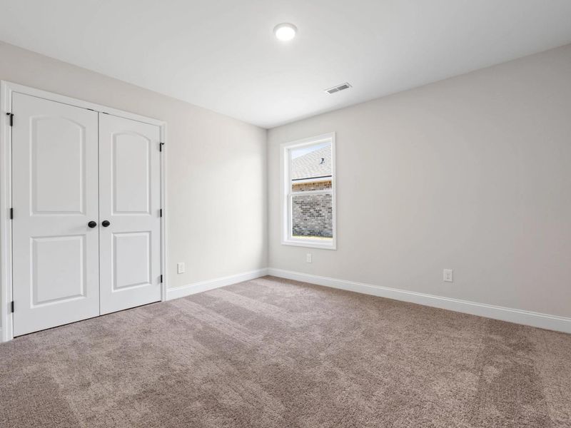 Representative unfurnished interior of a home built from the The Holly C by Davidson Homes LLC in Heartland, Heartland (Image 28). Representative unfurnished interior of a home built from the The Holly C by Davidson Homes LLC in Heartland, Heartland (Image 28).