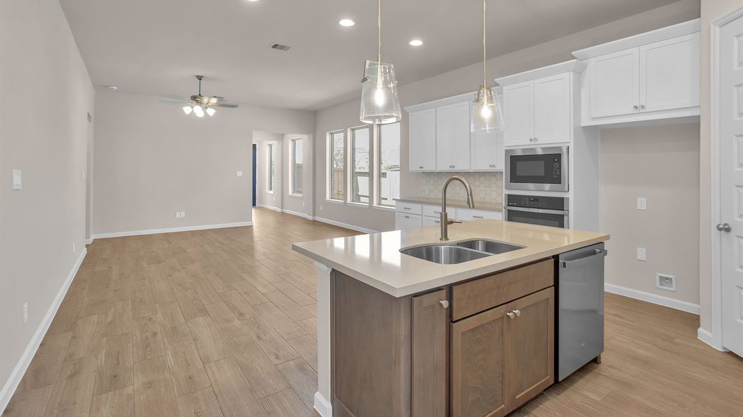 Furnished interior view inside a new home in Meridiana, Manvel (Image 7).
