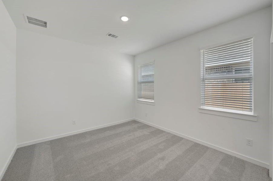 Spacious, unfurnished interior of a new home in Sundance Cove, Crosby (Image 32).