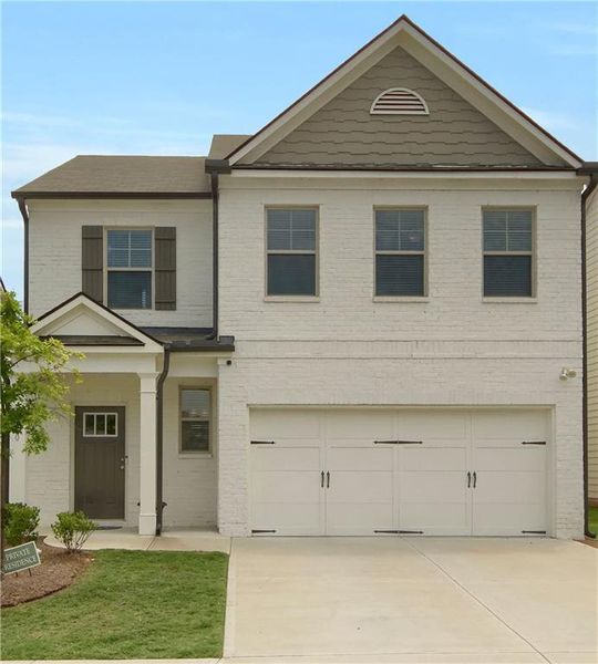 Front exterior of a new home in , Atlanta, GA, highlighting curb appeal (Image 23).