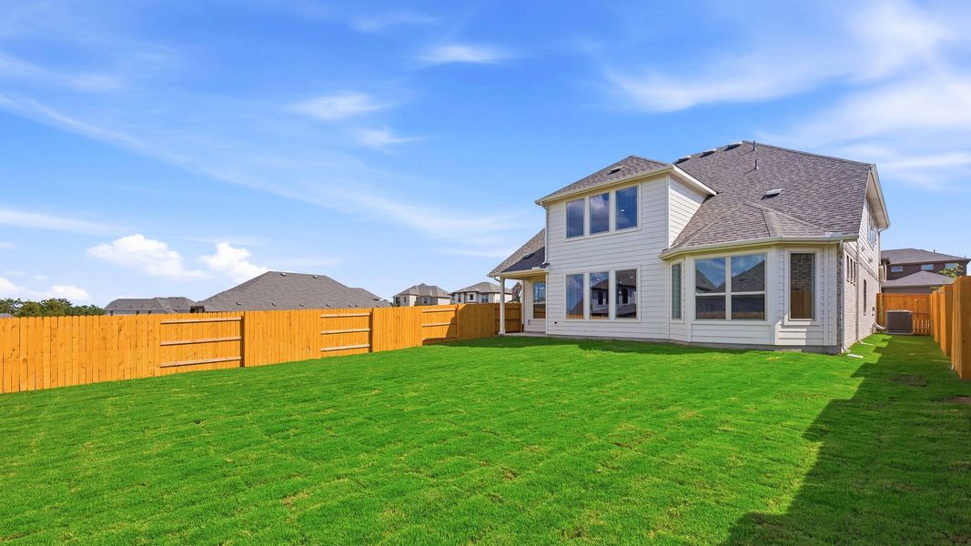 Exterior details and patio area of a home in Oaks at San Gabriel, Georgetown (Image 23).