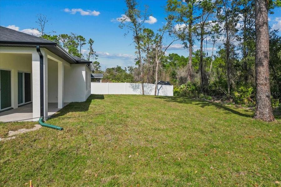 Exterior details and patio area of a home in , Deltona (Image 25).