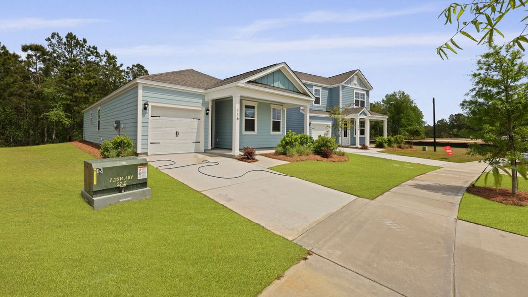 Front exterior of a new home in Sheep Island, Summerville, SC, highlighting curb appeal (Image 2).
