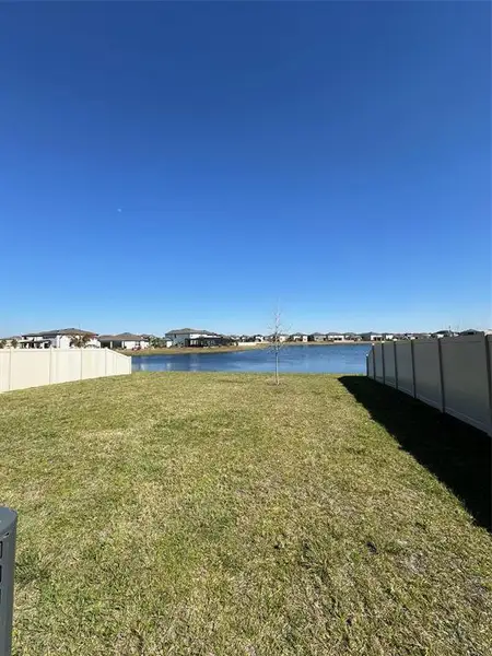 Exterior details and patio area of a home in Berry Bay, Wimauma (Image 8).