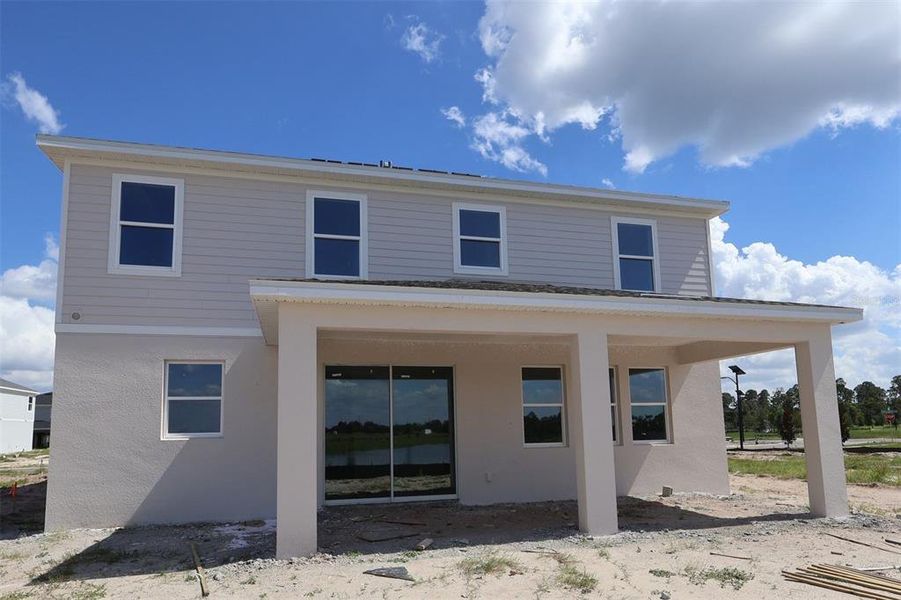 Exterior details and patio area of a home in Bay Lake Farms, St. Cloud (Image 17).