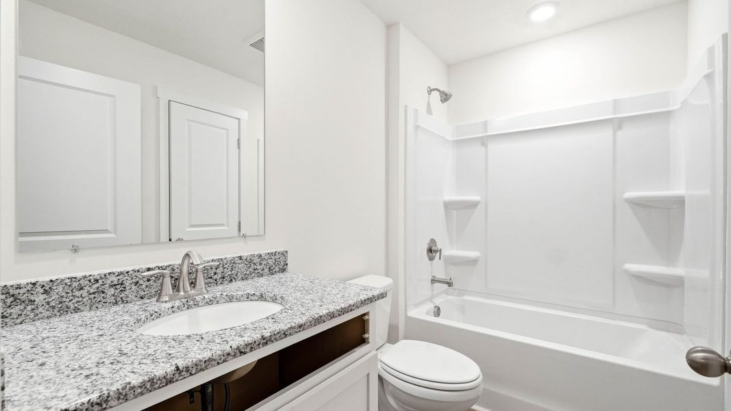 Furnished interior view inside a new home in Macon Townhomes, Seymour (Image 8). Furnished interior view inside a new home in Macon Townhomes, Seymour (Image 8).