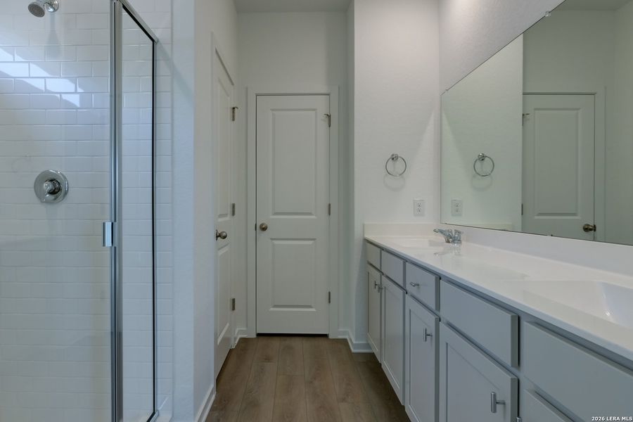 Furnished interior view inside a new home in Hennersby Hollow, San Antonio (Image 11).