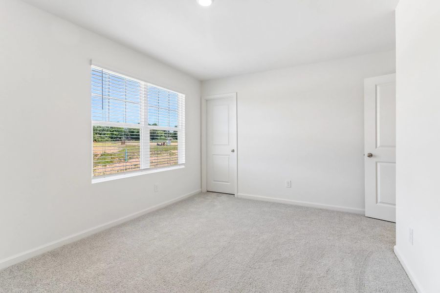 Representative unfurnished interior of a home built from the Copernicus by Starlight Homes in Vida Mar, League City (Image 20). Representative unfurnished interior of a home built from the Copernicus by Starlight Homes in Vida Mar, League City (Image 20).