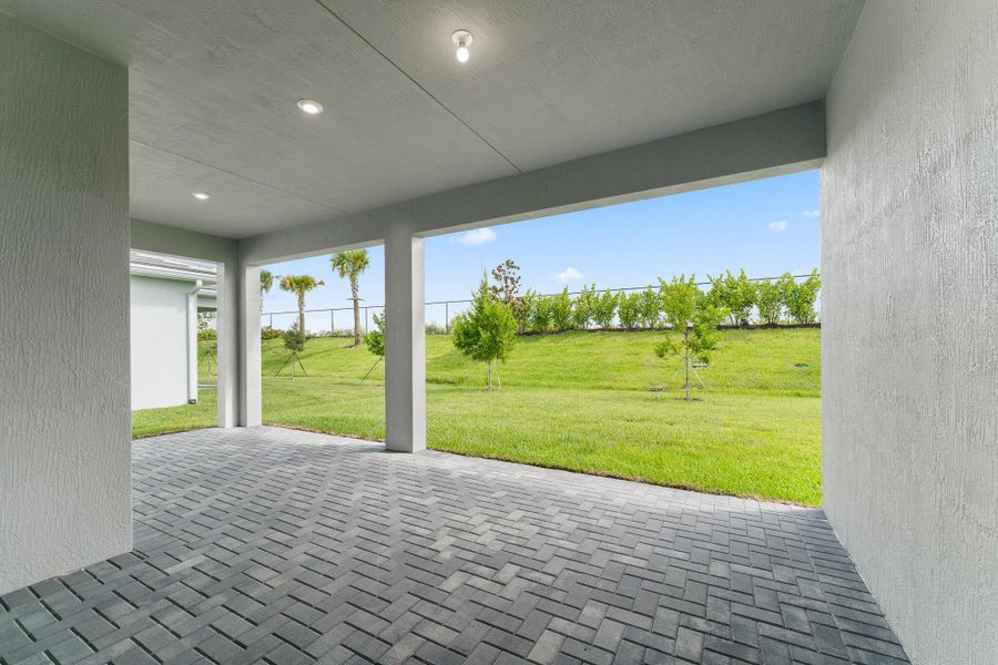 Exterior details and patio area of a home in Tradition - Telaro, Port St. Lucie (Image 1).