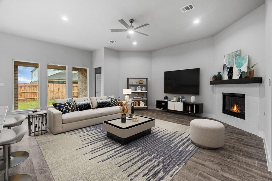 VS Family Room. Family room flooded with natural light through the expansive windows. The premium tile flooring adds a touch of luxury to the space, creating the perfect setting for relaxing moments and cherished gatherings with loved ones. Sample photo of completed home with similar floor plan. Actual colors and selections may vary. VS Family Room. Family room flooded with natural light through the expansive windows. The premium tile flooring adds a touch of luxury to the space, creating the perfect setting for relaxing moments and cherished gatherings with loved ones. Sample photo of completed home with similar floor plan. Actual colors and selections may vary.