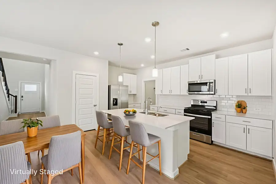 Furnished interior view inside a new home in Granger Pointe - Traditional Series, Conroe (Image 4).