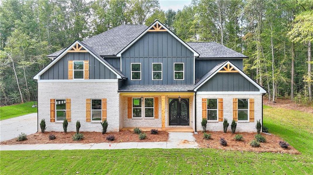 Front exterior of a new home in , Monroe, GA, highlighting curb appeal (Image 16). Front exterior of a new home in , Monroe, GA, highlighting curb appeal (Image 16).