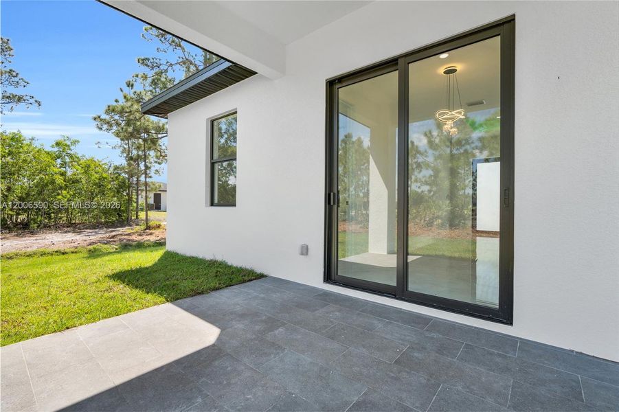 Exterior details and patio area of a home in , Lehigh Acres (Image 3).