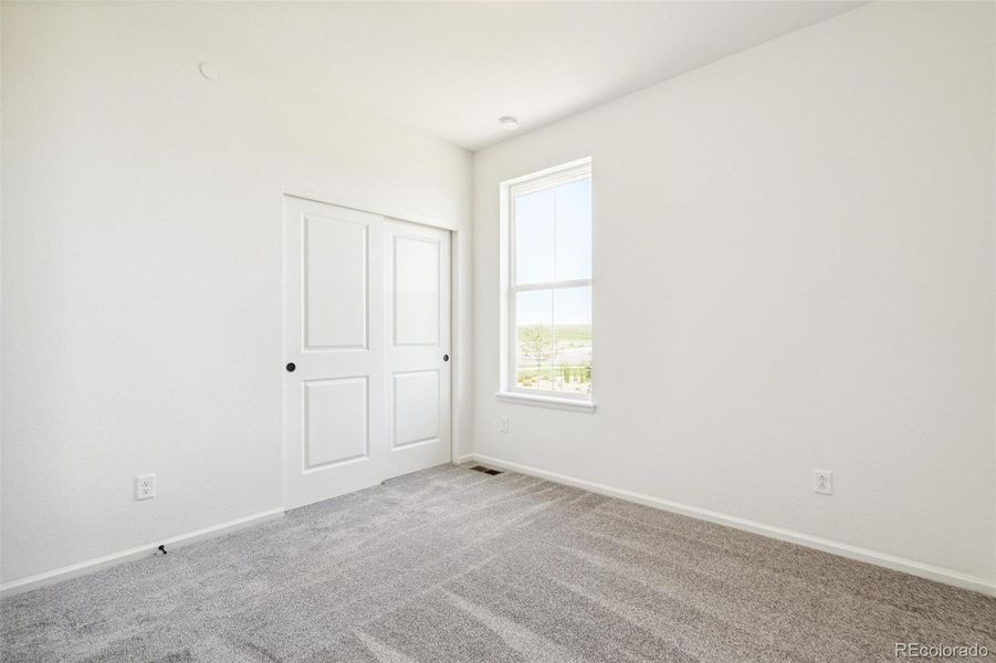 Spacious, unfurnished interior of a new home in Legato, Commerce City (Image 22).