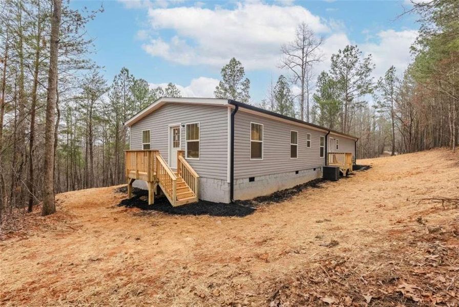 Exterior details and patio area of a home in , Ball Ground (Image 2). Exterior details and patio area of a home in , Ball Ground (Image 2).