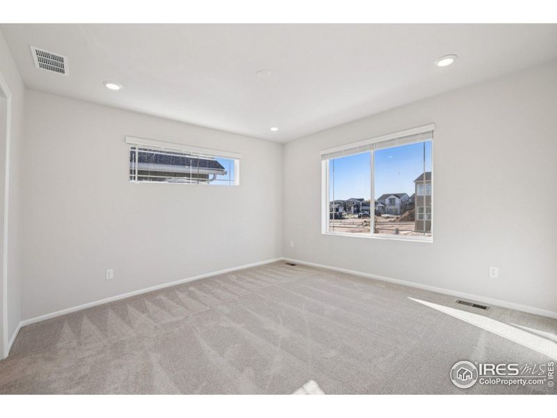 Spacious, unfurnished interior of a new home in The Villas Collection at Sterling Ranch, Littleton (Image 24).