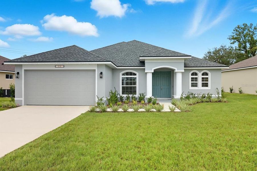 Front exterior of a new home in , Homosassa, FL, highlighting curb appeal (Image 2).