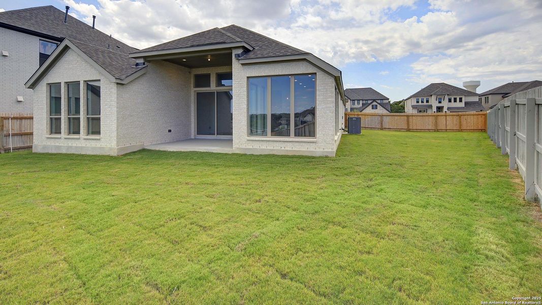 Front exterior of a new home in Stevens Ranch 55', San Antonio, TX, highlighting curb appeal (Image 24).