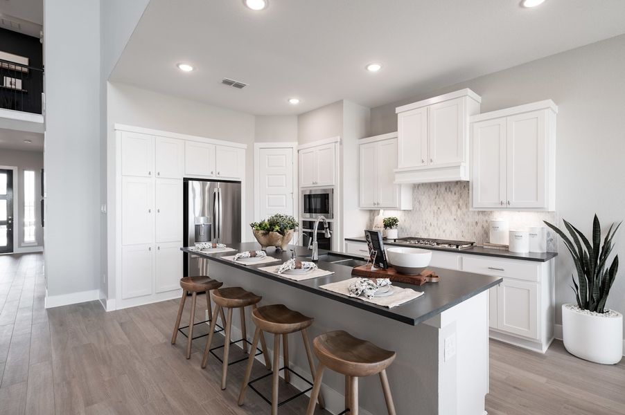 Representative furnished interior of a home built from the Verdin by Tri Pointe Homes in Pecan Ridge, Fulshear (Image 53).