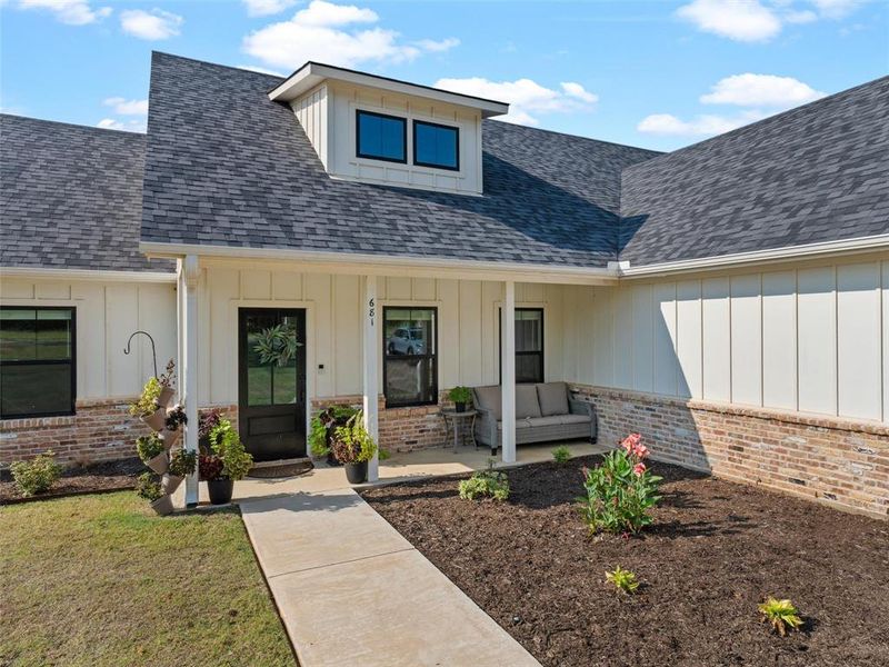 Front exterior of a new home in , Kilgore, TX, highlighting curb appeal (Image 19). Front exterior of a new home in , Kilgore, TX, highlighting curb appeal (Image 19).