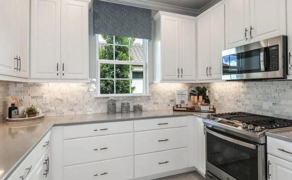 Furnished interior view inside a new home in Esplanade at Azario Lakewood Ranch, Bradenton (Image 9).