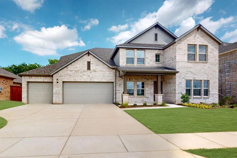 Front exterior of a new home in The Preserve, Justin, TX, highlighting curb appeal (Image 17).