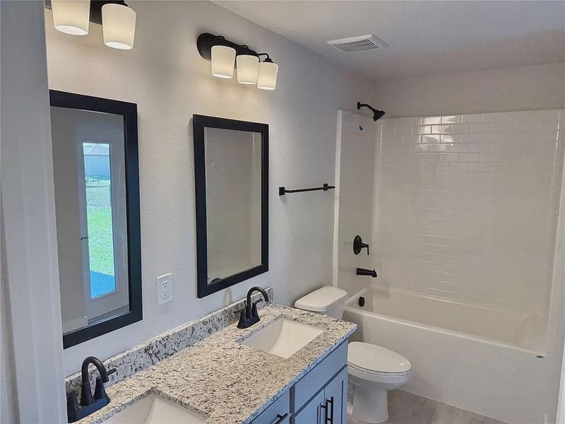 Furnished interior view inside a new home in South Gulf Cove, Port Charlotte (Image 11).