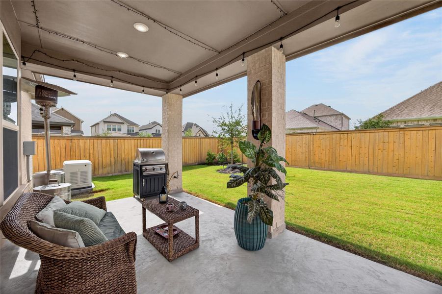Covered patio with gas hookup and lighting perfect for outdoor entertaining! Covered patio with gas hookup and lighting perfect for outdoor entertaining!