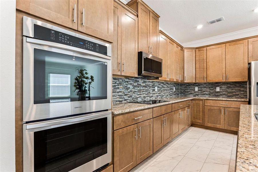 Furnished interior view inside a new home in Villa Pass, Mascotte (Image 6). Furnished interior view inside a new home in Villa Pass, Mascotte (Image 6).