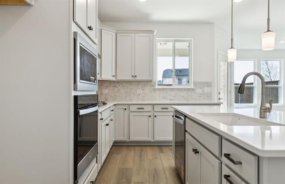 Gourmet kitchen designed for culinary excellence and entertaining *Real home pictured Gourmet kitchen designed for culinary excellence and entertaining *Real home pictured