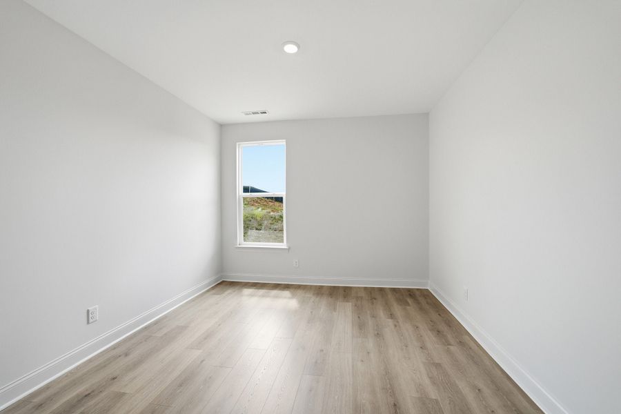 Spacious, unfurnished interior of a new home in Dorris Farm, White House (Image 45).