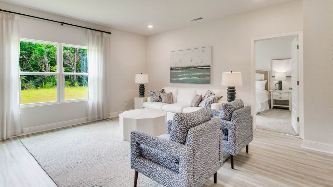 Furnished interior view inside a new home in Ashton Park Phase III, Freeport (Image 10).