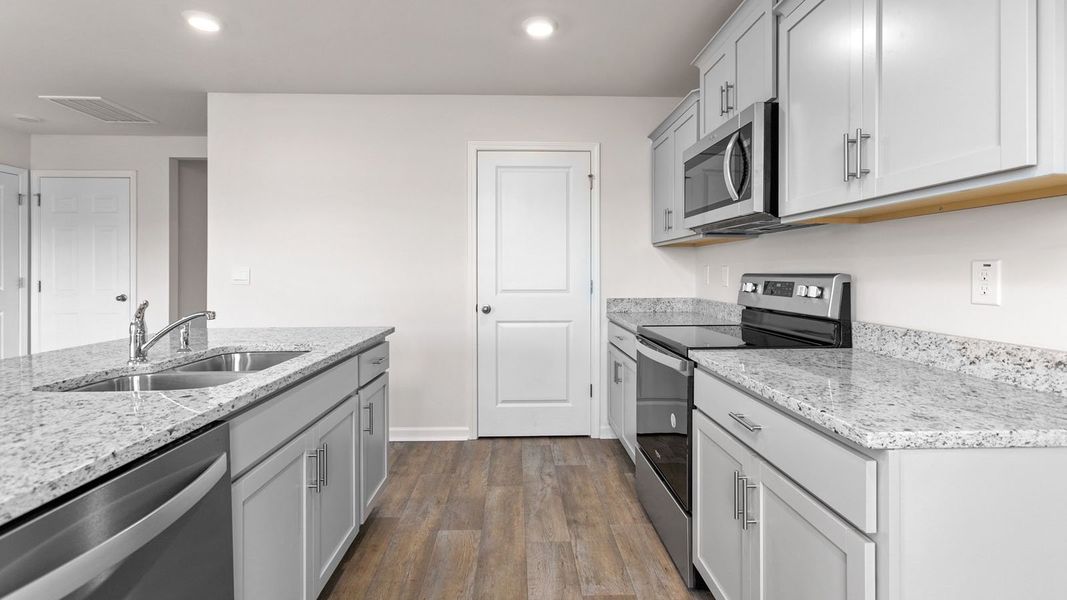 Representative furnished interior of a home built from the PENWELL by D.R. Horton in Aurora Acres, Snow Camp (Image 7).