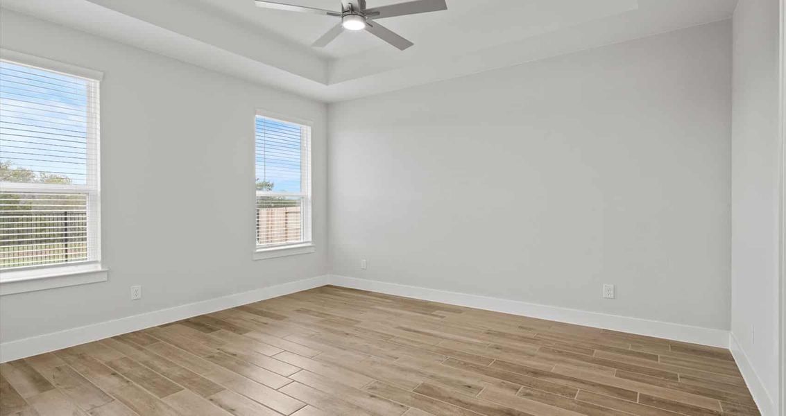 Representative unfurnished interior of a home built from the Aspen by Chesmar Homes in Village at Three Oaks, Seguin (Image 9).