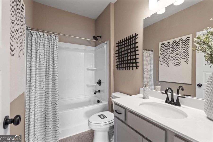 Furnished interior view inside a new home in Glendale Towns, Conyers (Image 15). Furnished interior view inside a new home in Glendale Towns, Conyers (Image 15).