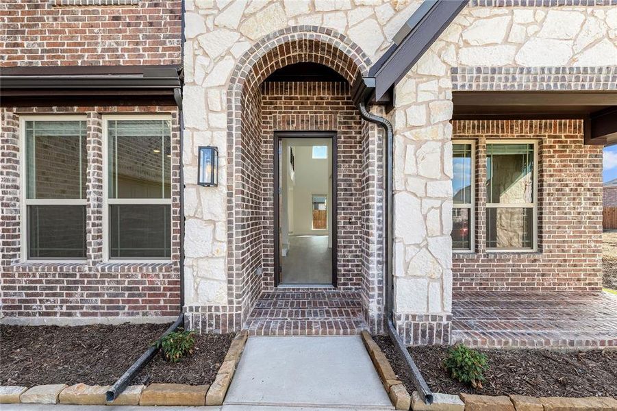Exterior details and patio area of a home in West Crossing, Anna (Image 28). Exterior details and patio area of a home in West Crossing, Anna (Image 28).