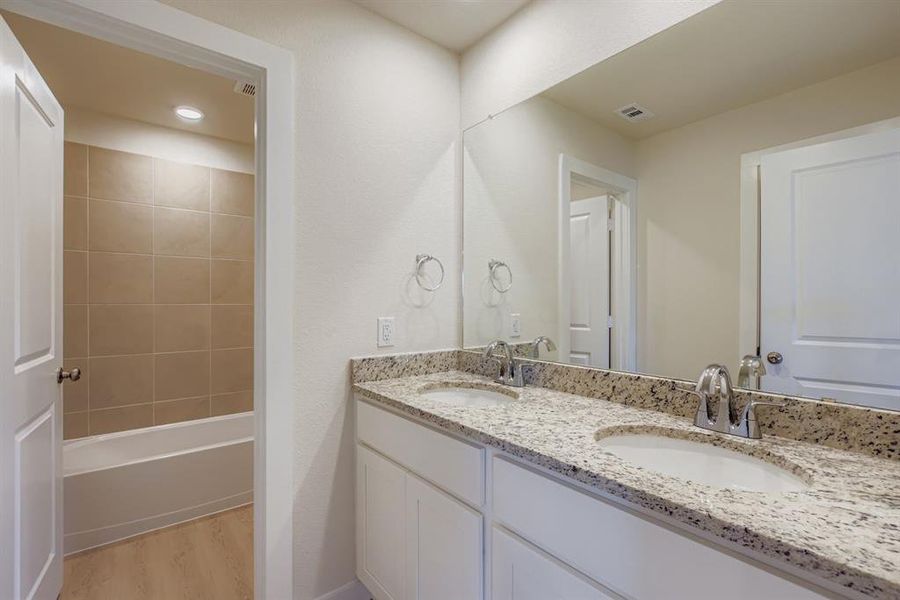 Furnished interior view inside a new home in Sperling Farms, Ferris (Image 10).