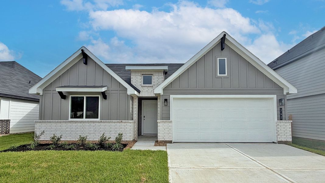 Front exterior of a new home in Silverthorne, Conroe, TX, highlighting curb appeal (Image 1). Front exterior of a new home in Silverthorne, Conroe, TX, highlighting curb appeal (Image 1).