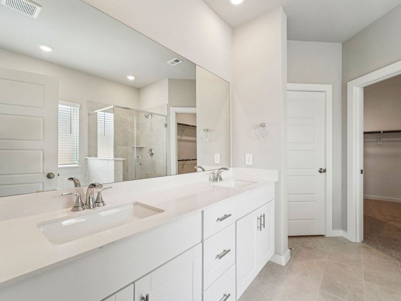 Furnished interior view inside a new home in Heights of Barbers Hill, Mont Belvieu (Image 8).