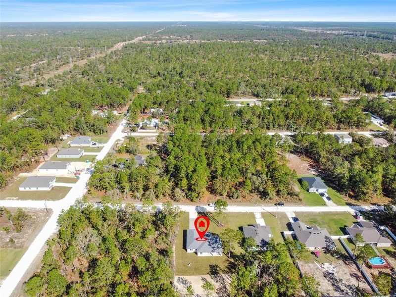 Front exterior of a new home in , Weeki Wachee, FL, highlighting curb appeal (Image 35). Front exterior of a new home in , Weeki Wachee, FL, highlighting curb appeal (Image 35).