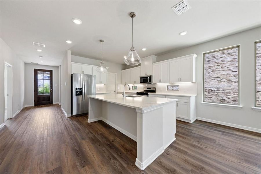 Light, bright and spacious, you'll find the kitchen of your dreams in this wonderful home!