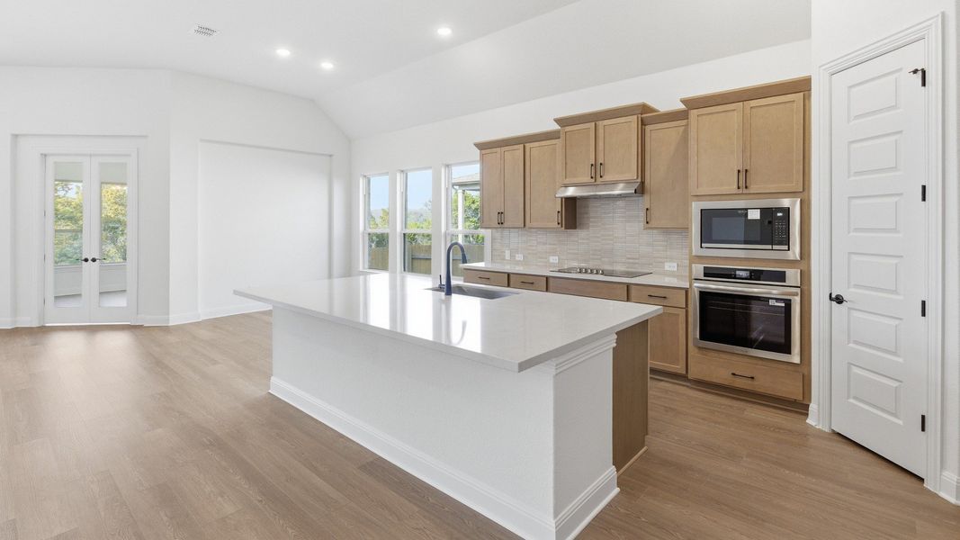 Furnished interior view inside a new home in Oaks at San Gabriel, Georgetown (Image 8).