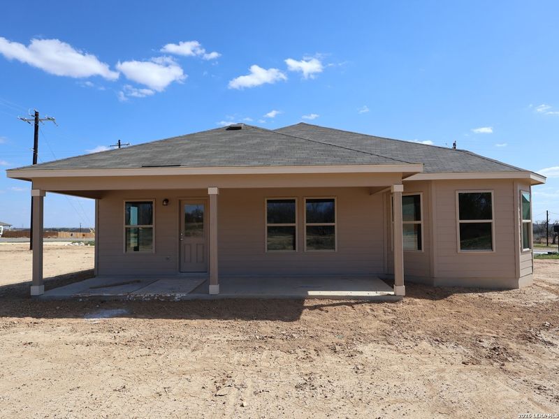 Exterior details and patio area of a home in Chaparral Ranch, Floresville (Image 3).