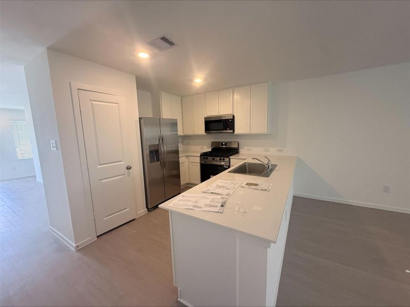 Furnished interior view inside a new home in Sweetgrass Village, Crosby (Image 32).