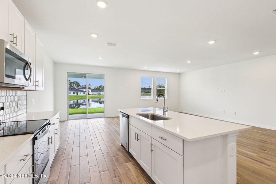 Furnished interior view inside a new home in Lakes at Bella Lago - Signature Series, Green Cove Springs (Image 10).