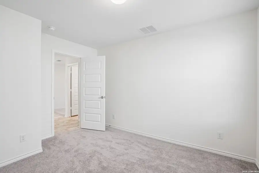 Spacious, unfurnished interior of a new home in Medina Crossing, Von Ormy (Image 28).