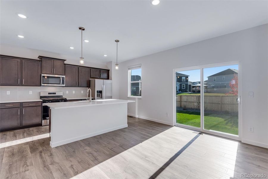 Furnished interior view inside a new home in Trails at Crowfoot, Parker (Image 13).