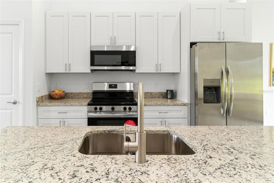 Furnished interior view inside a new home in , Kissimmee (Image 18).