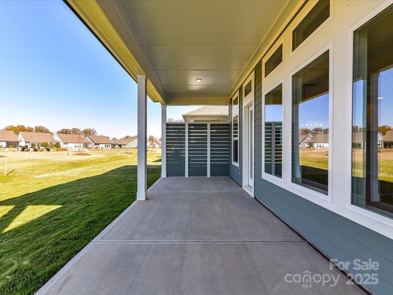 Exterior details and patio area of a home in Encore at Streamside - Tradition Series, Waxhaw (Image 32).