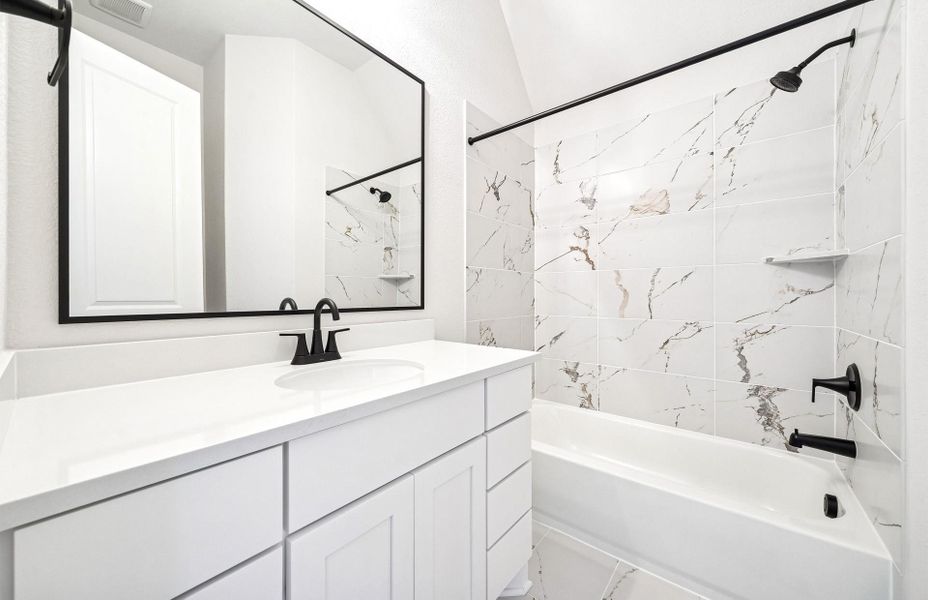 Furnished interior view inside a new home in Bridgeland 60′, Cypress (Image 11).